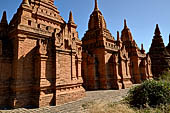 The cluster of red brick temples, named Khay-min-gha on the map on the North plain of Bagan. Myanmar. 